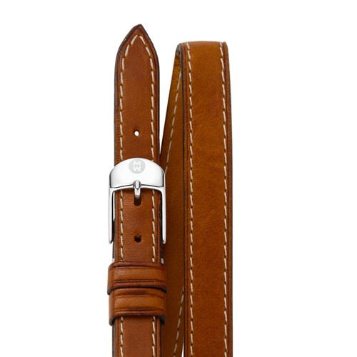 This saddle calf skin strap wraps around the wrist twice and is easily interchangeable with any 12mm Michele watch. The stainless steel buckle has the signature Michele logo engraving.
